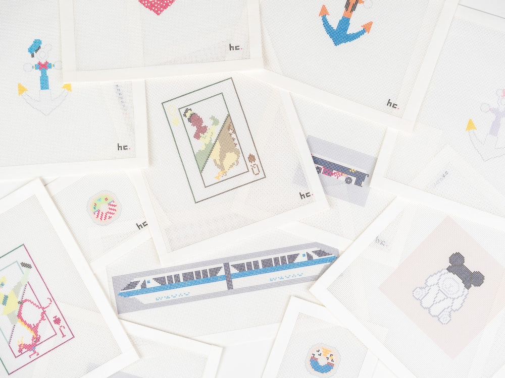 Collage of needlepoint canvases