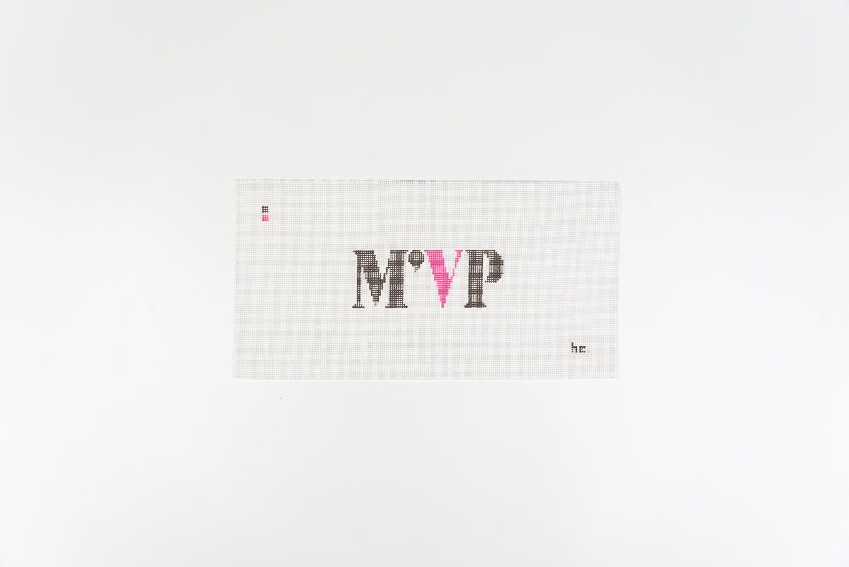 Printed needlepoint canvas reading M'VP in charcoal serif capitals with a hot pink V on open white canvas, 13 mesh, full view