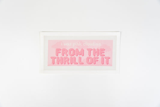 Pink Clouding needlepoint canvas, white script and puffy coral pink letters on a pale pink cloud background, 18 mesh, full view