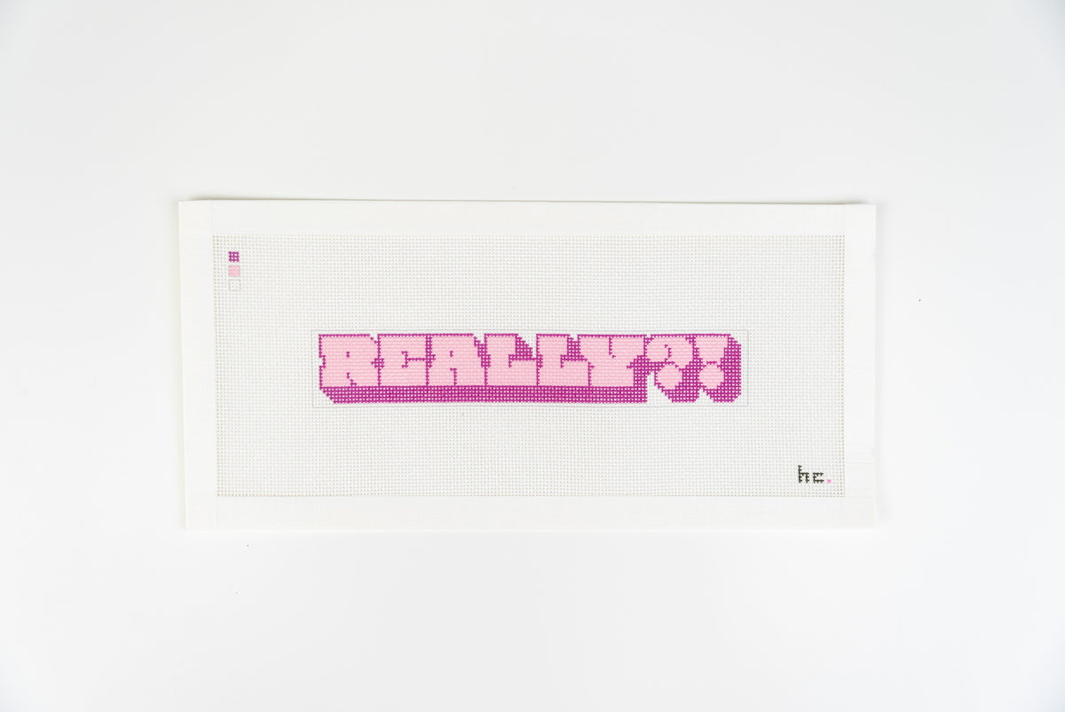 Really!? printed needlepoint canvas, light and dark pink bubble letters, closer view of the whole canvas